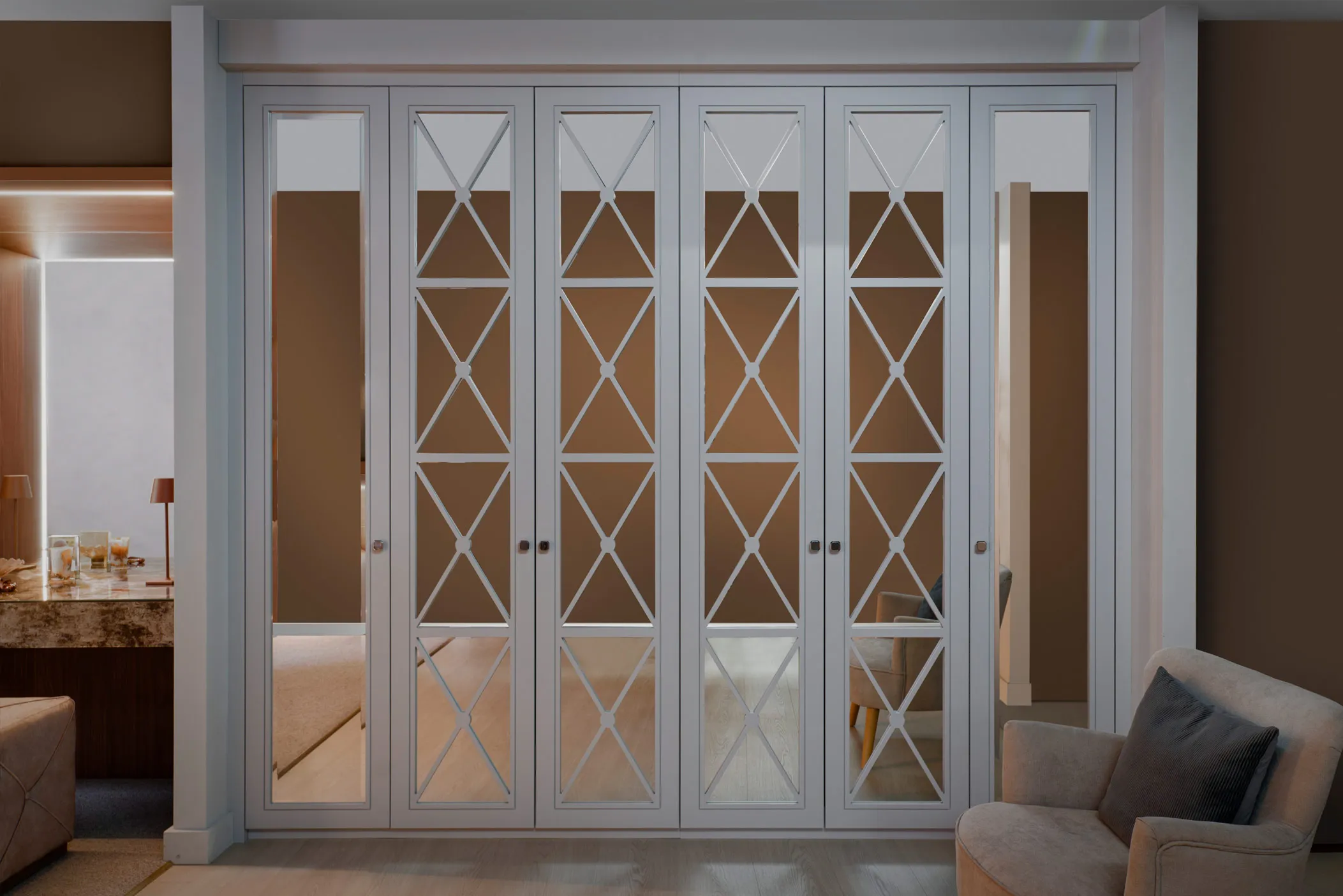 Fitted wardrobe with white doors and lattice mirrored panels in the Tunbridge Wells showroom