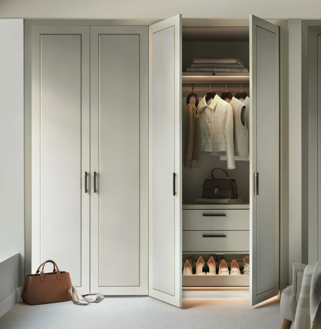 Belgravia wardrobe in light dove grey with doors open showing hanging rail and drawers