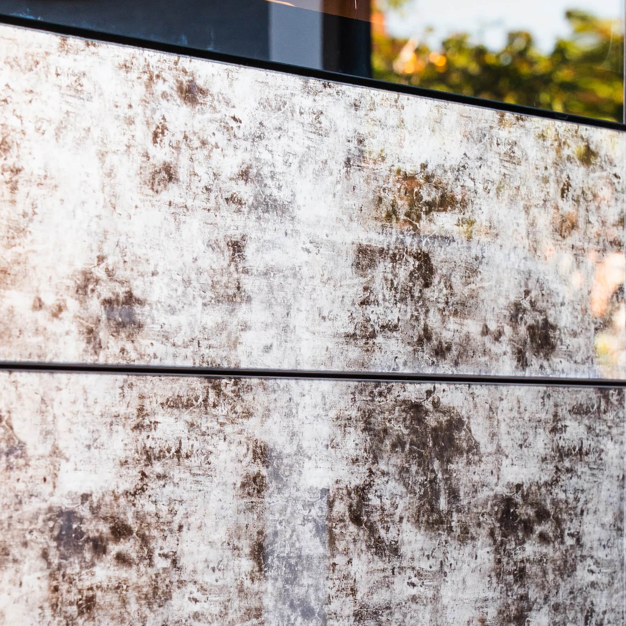 Close-up of mottled decorative glass panels on wardrobe doors