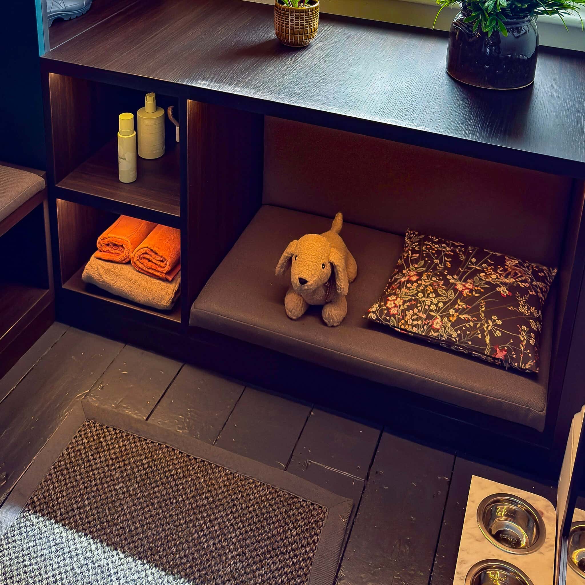 Integrated dog bed built into bespoke boot room cabinetry