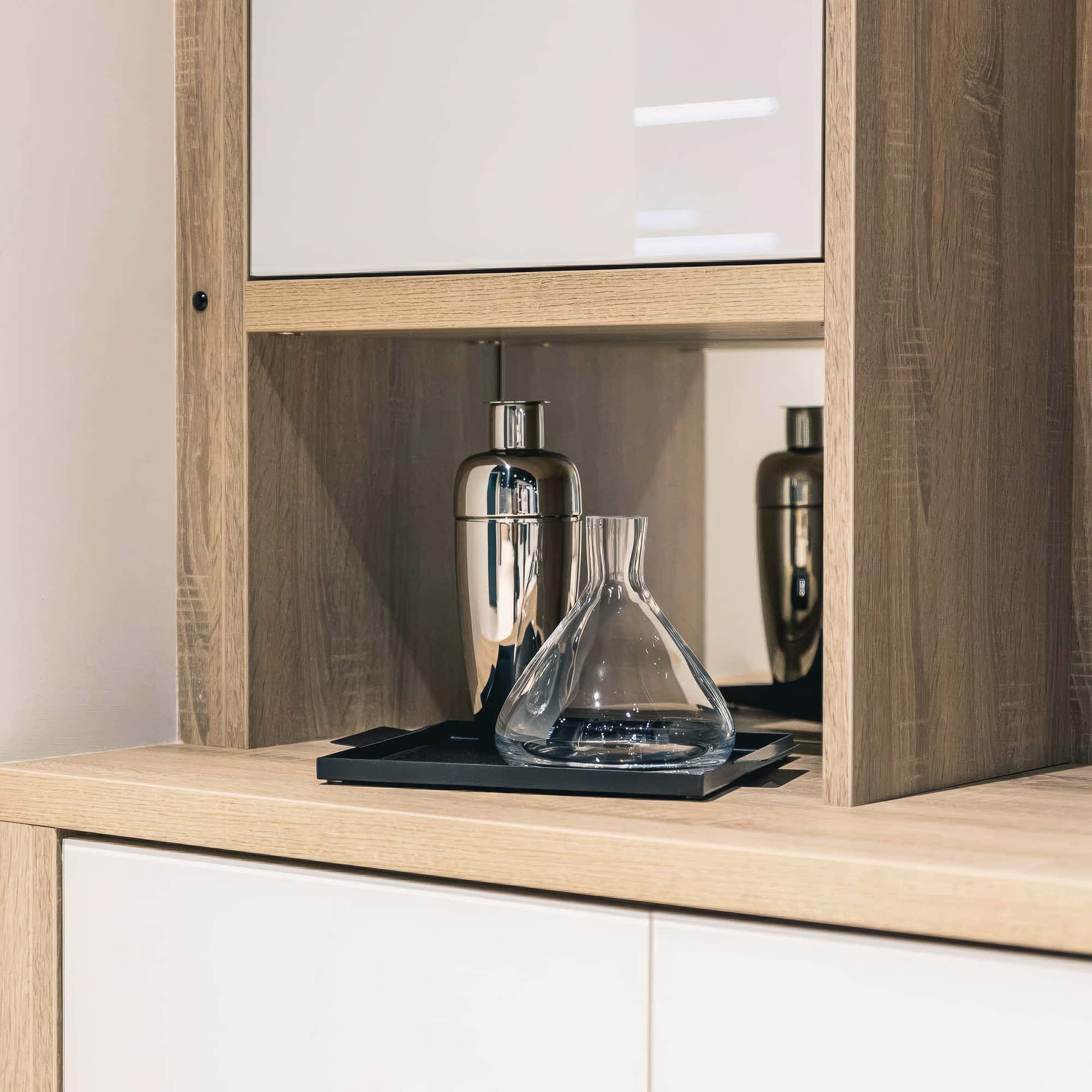 Detail of bespoke media wall cabinetry and finishes