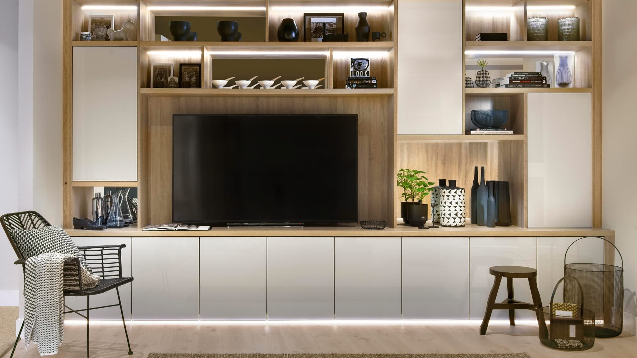 Bespoke media wall with integrated television, shelving and lighting