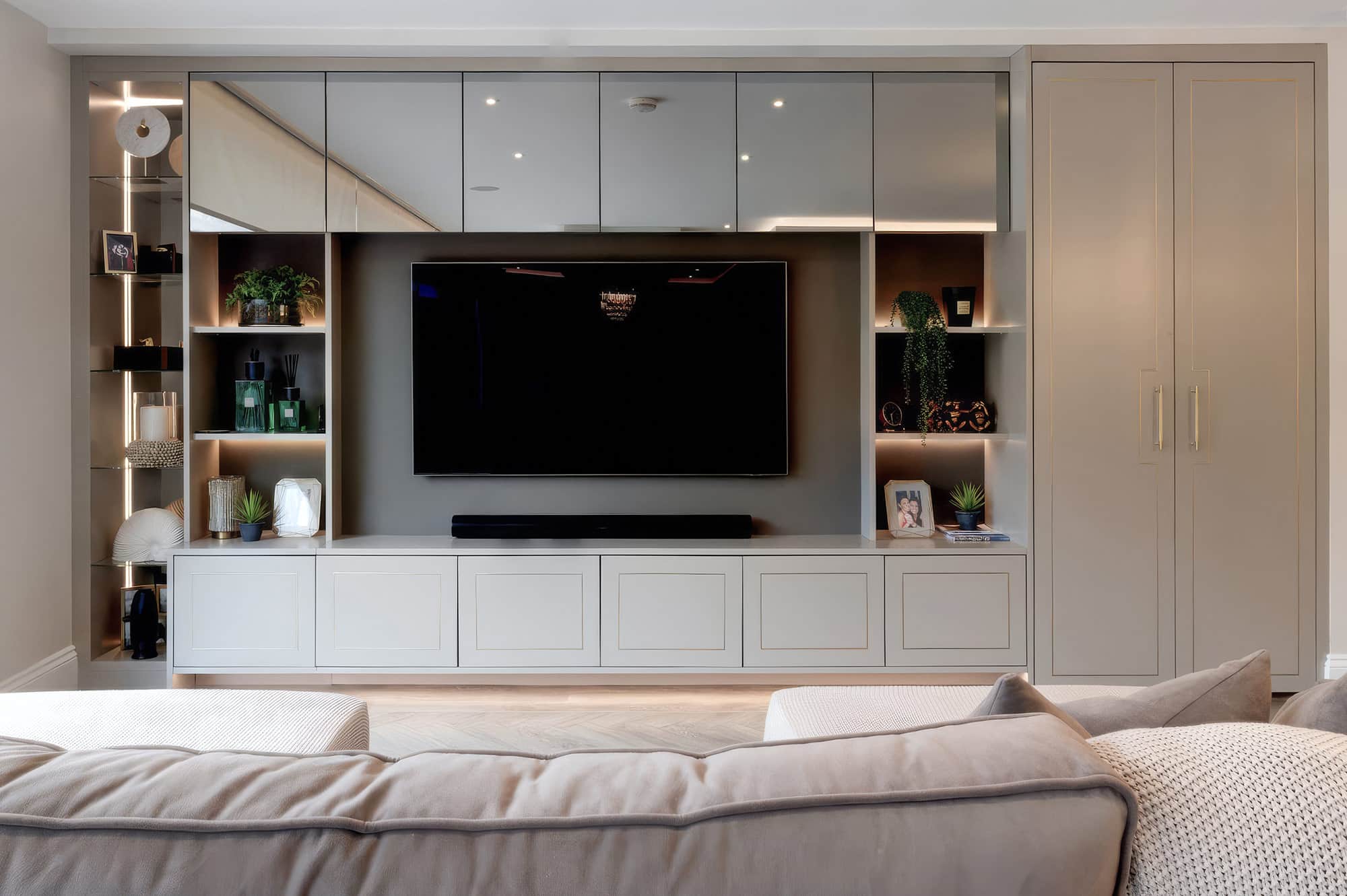 Bespoke media wall with concealed storage and display shelving