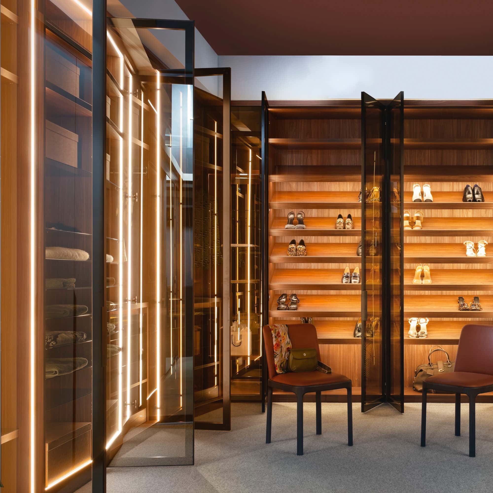 Interior LED lighting inside a bespoke glass-fronted wardrobe