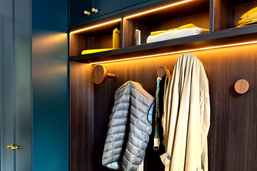 Boot room clothes hanging.